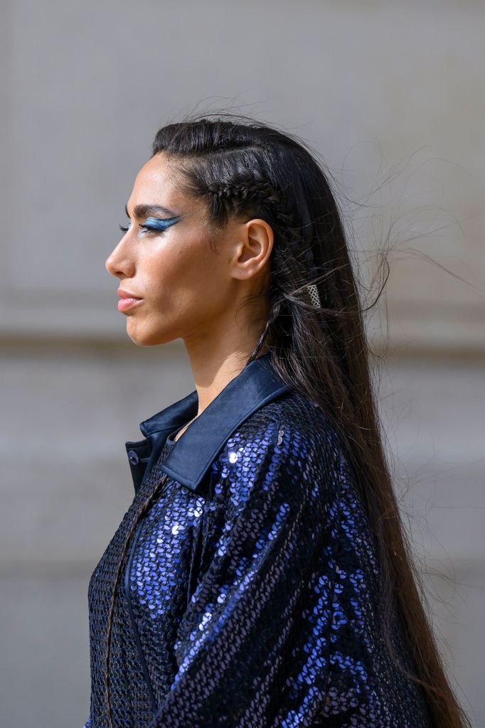  Ciinderella Balthazar wears an Akris jacket and dress outside the Akris show during the Womenswear Spring Summer 2026 as part of Paris Fashion Week on October 03, 2025 in Paris, France. (Photo by Kirstin Sinclair/Getty Images)
