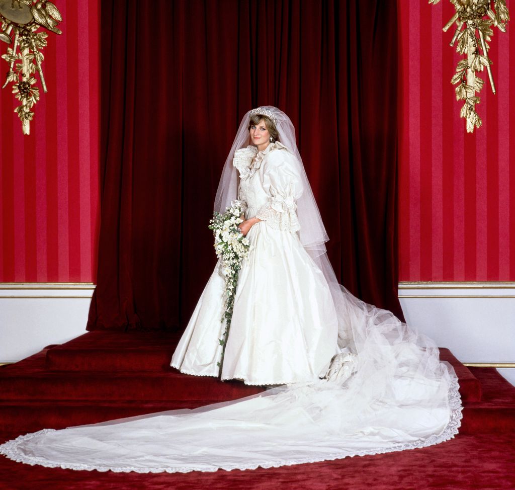 Princess Diana in her bridal gown at Buckingham Palace after her marriage to Prince Charles