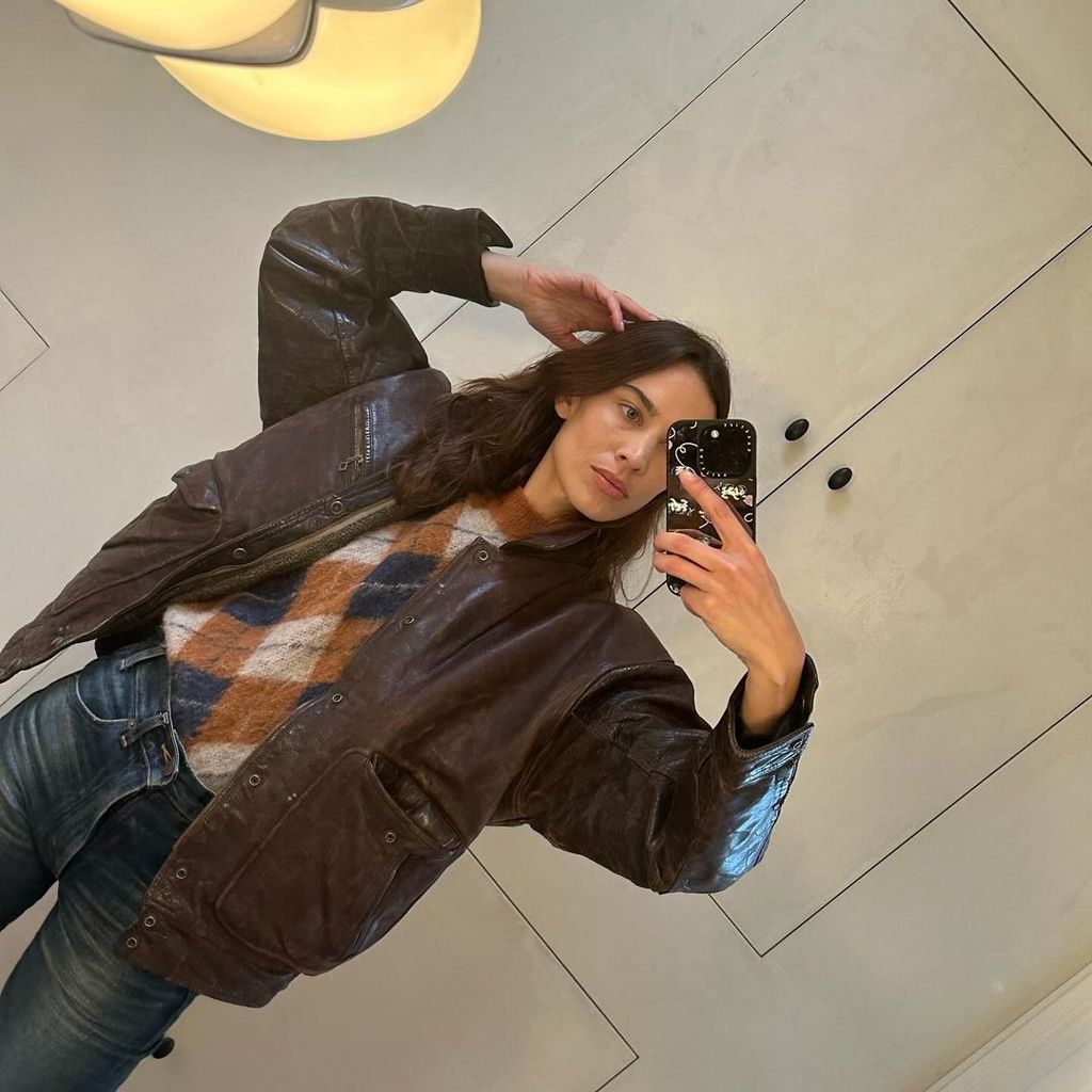 Alexa Chung wearing a brown vintage jacket