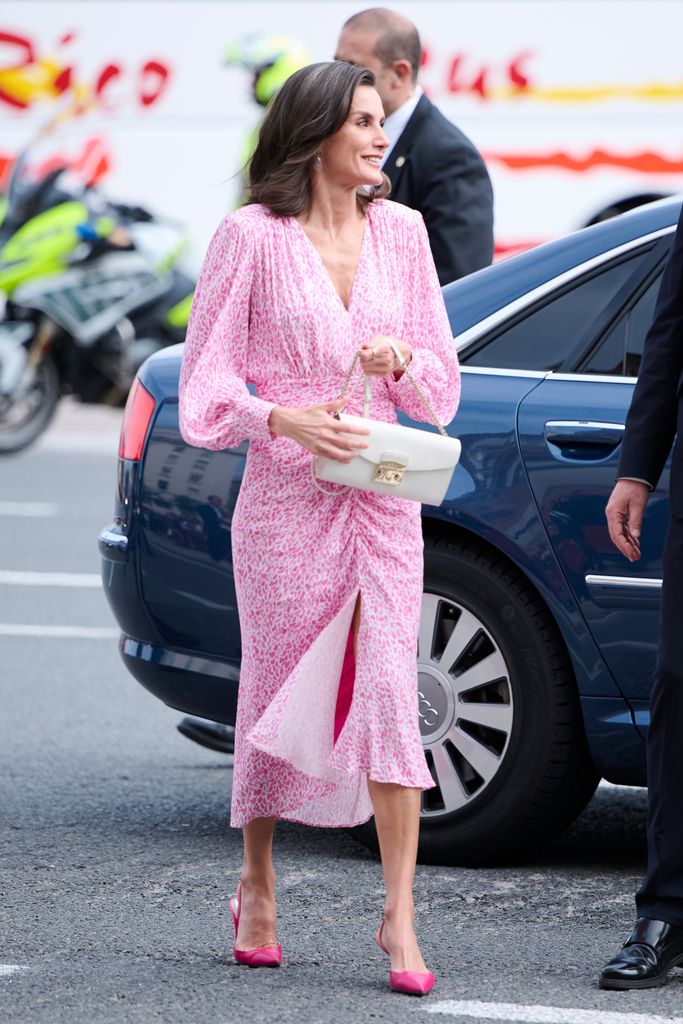 Queen Letizia arriving in pink speckled dress