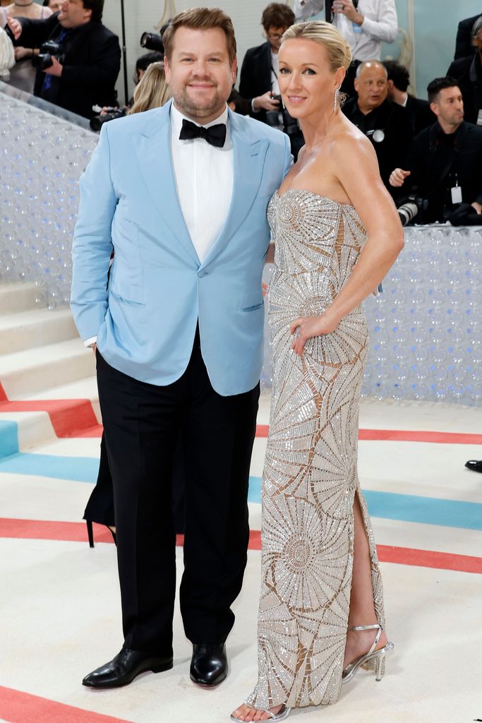 James Corden in a blue jacket with his wife Julia Carey in an embellished gown at the 2023 Met Gala