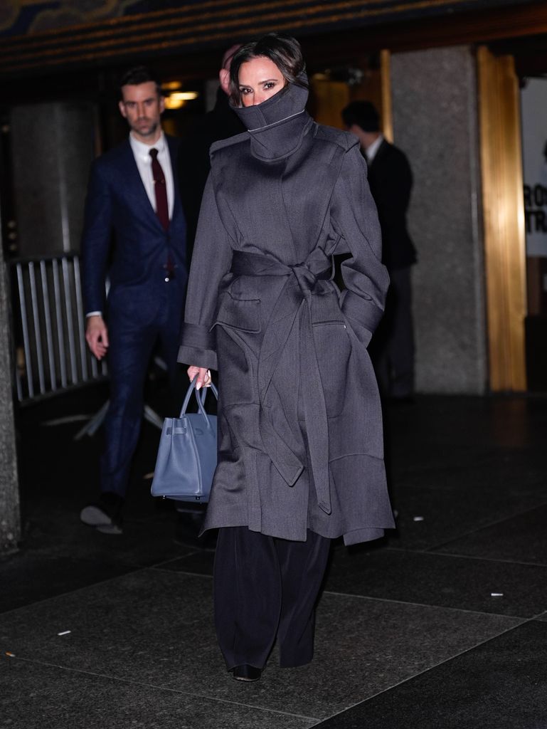 victoria beckham in grey funnel neck coat
