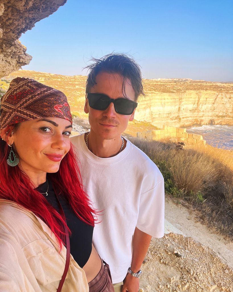 couple posing for photo on holiday