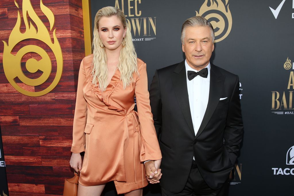 photo of ireland baldwin holding hands with alec baldwin