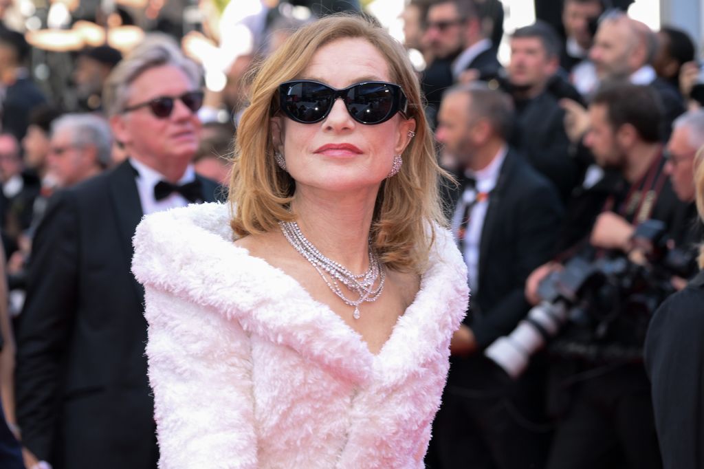 Isabelle Huppert attends the "Horizon: An American Saga" Red Carpet at the 77th annual Cannes Film Festival at Palais des Festivals on May 19, 2024 