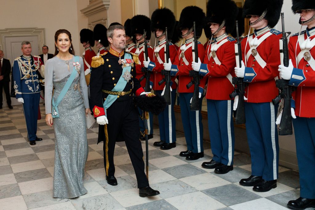 King Frederik X and Queen Mary of Denmark arrive at the royal couple's New Year's reception for officers from the armed forces and the emergency management agency at Christiansborg Palace in Copenhagen