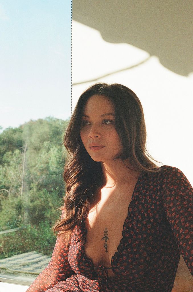 Melissa O'Neill poses for a photoshoot