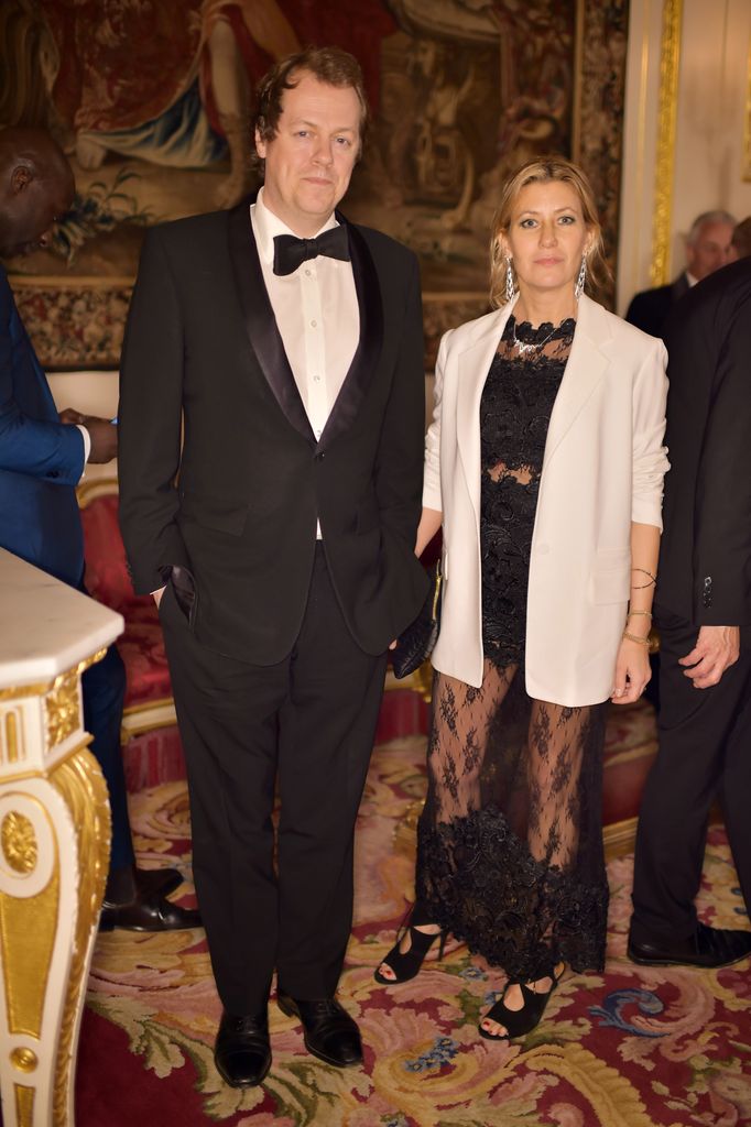 Tom Parker Bowles in a tux and Sara Buys in a black lace dress and white blazer