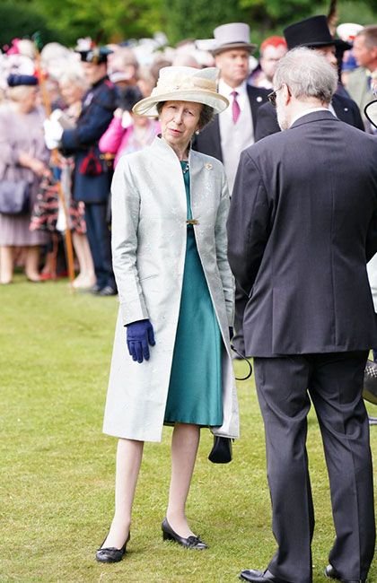 Princess Anne pairs silky gown with flamboyant mantle for special ...