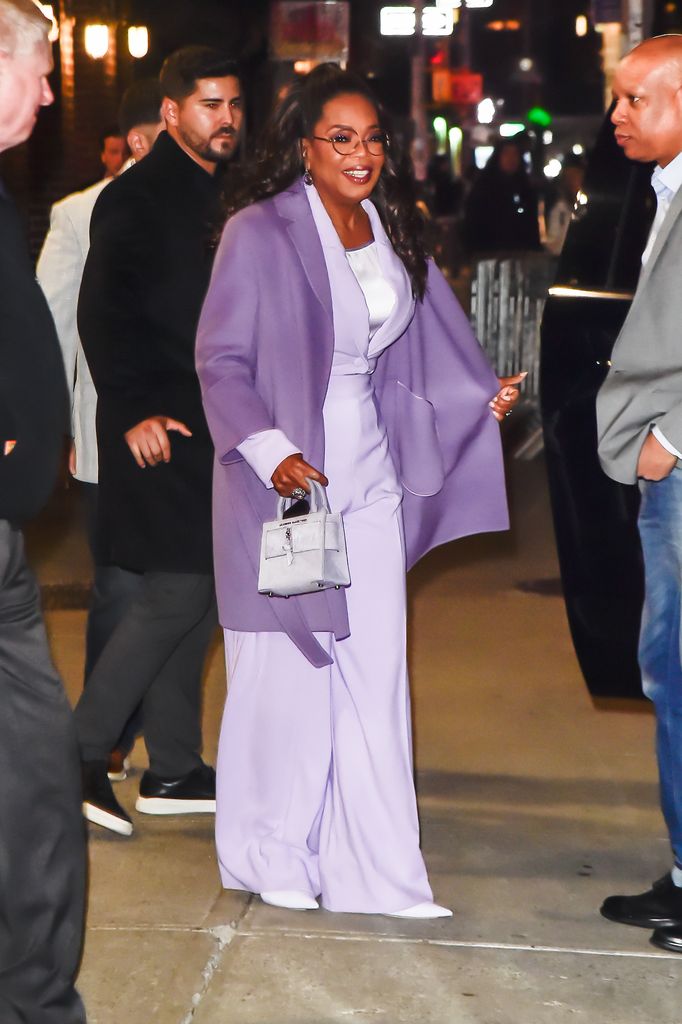 Oprah in lilac jumpsuit