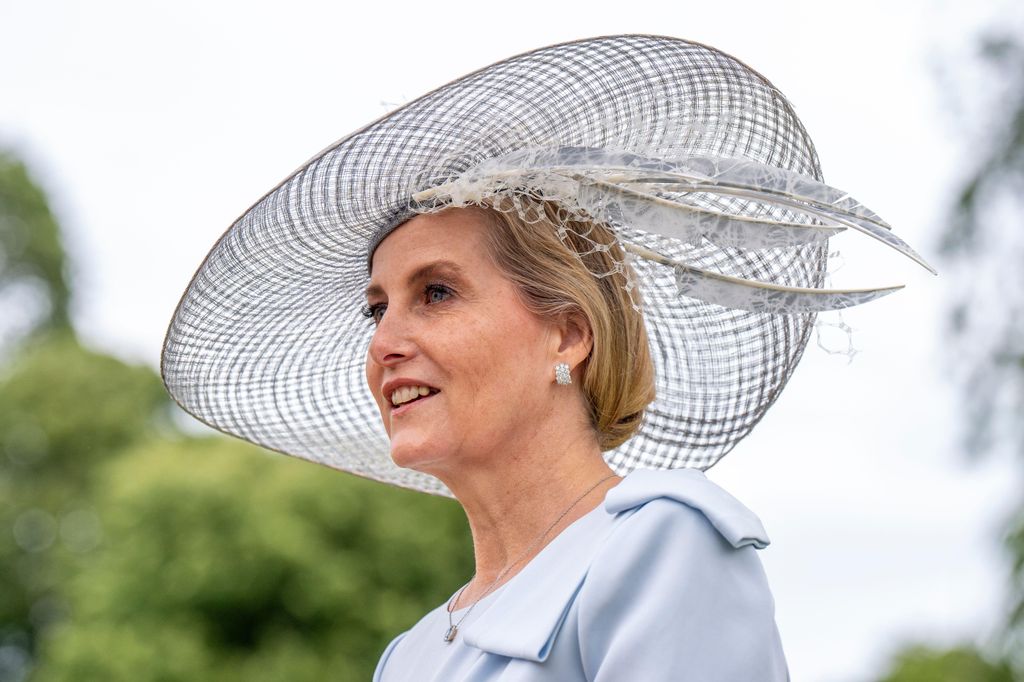 Duchess Sophie in blue dress and feathered hat