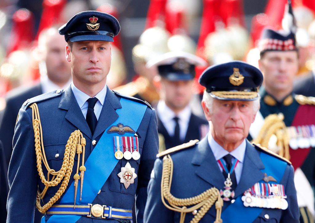 Prince William and King Charles in military uniform