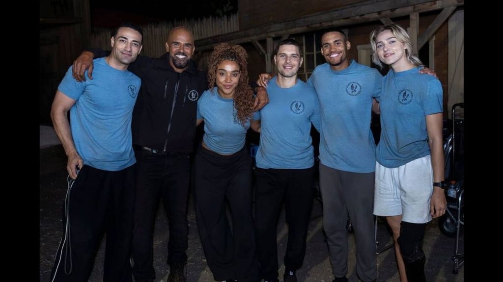 Shemar Moore (2L) with cast of SWAT Exiles