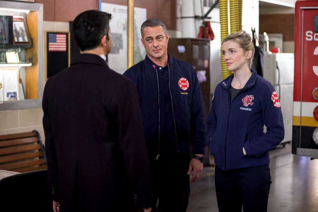 CHICAGO FIRE -- "The Man of the Moment" Episode 1113 -- Pictured: (l-r) Assaf Cohen as Alexander, Taylor Kinney as Kelly Severide, Kara Killmer as Sylvie Brett