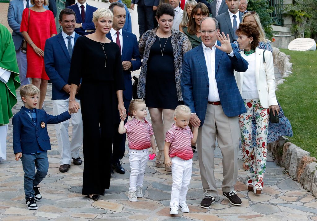Prince Albert II of Monaco and his wife Princess Charlene arrive with their twins Prince Jacques (C-R), Princess Gabriella (C-L) to take part in the traditional Monaco's picnic