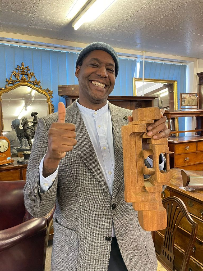 man in antiques shop