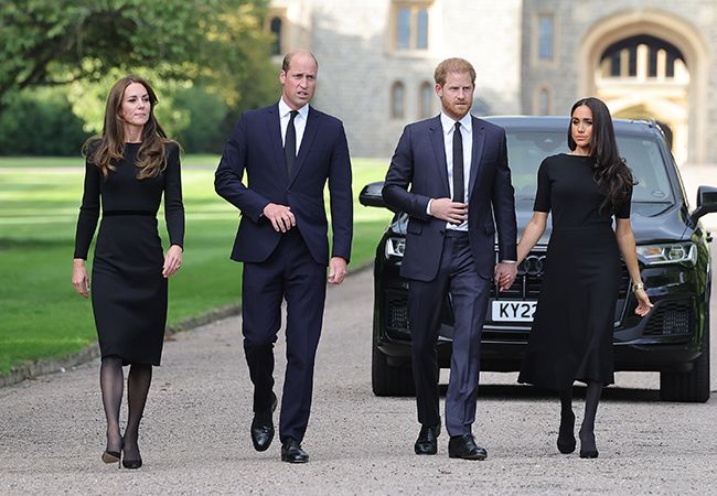 Prince Harry and Meghan walking alongside William and Kate after the Queens death