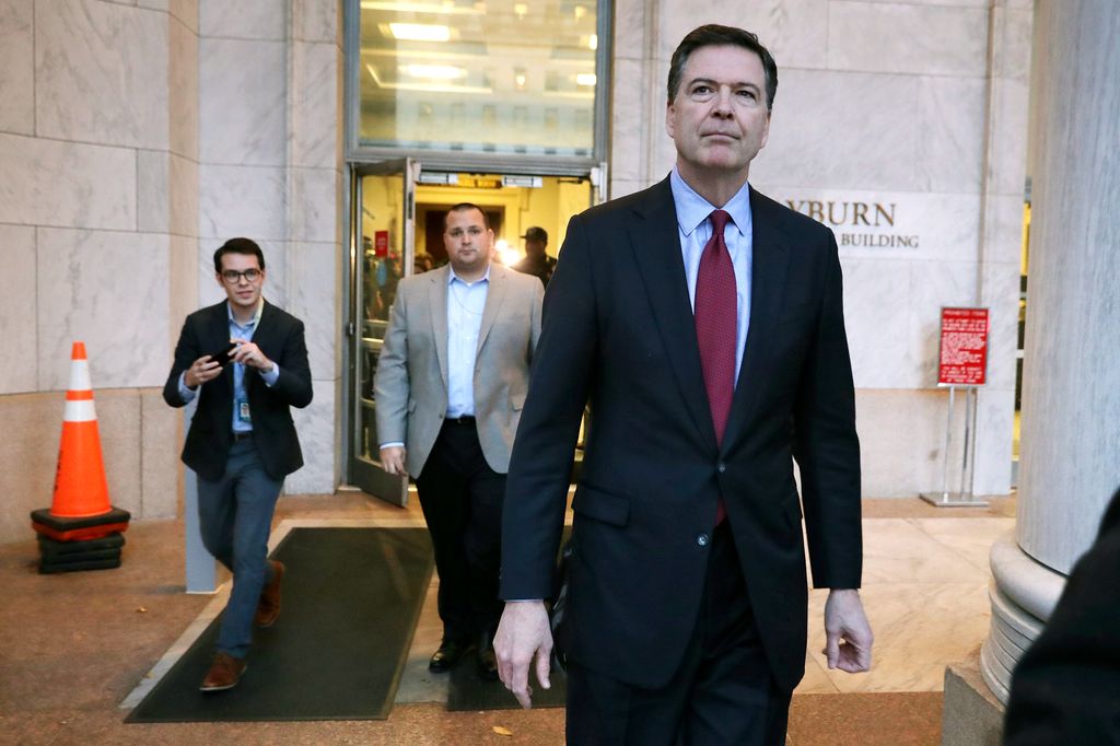 Former Federal Bureau of Investigation Director James Comey leaves the Rayburn House Office Building after testifying to the House Judiciary and Oversight and Government Reform committees on Capitol Hill December 07, 2018