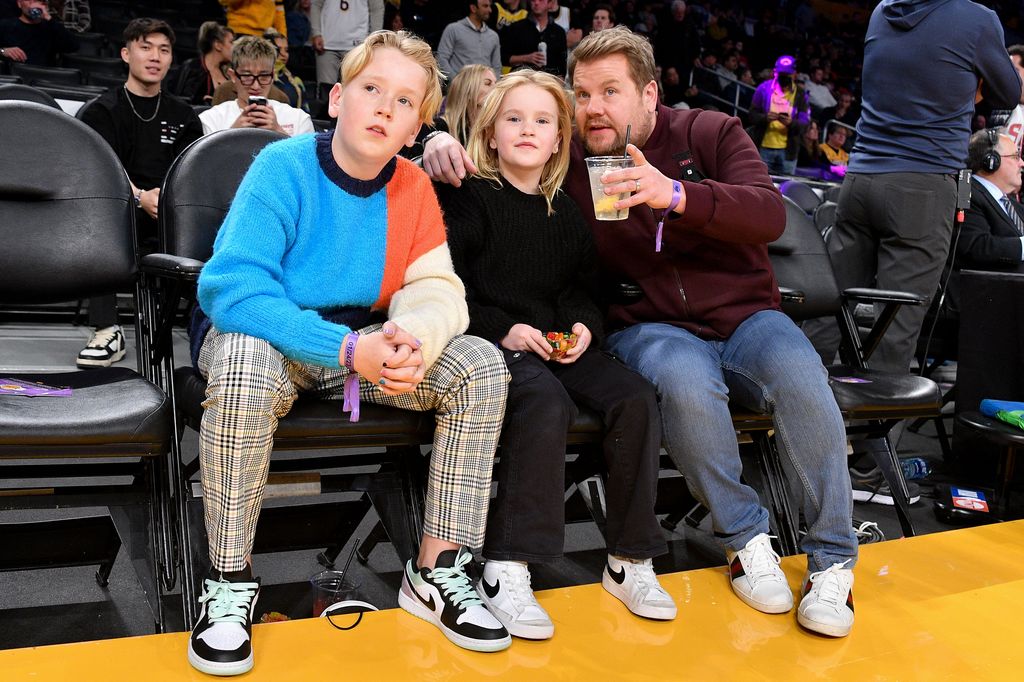 James Corden and his kids Max Corden and Carey Corden attend a basketball game between the Los Angeles Lakers and the Los Angeles Clippers at Crypto.com Arena on January 24, 2023 in Los Angeles, California