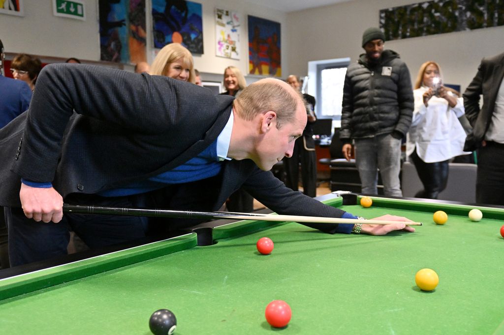 Prince William playing pool