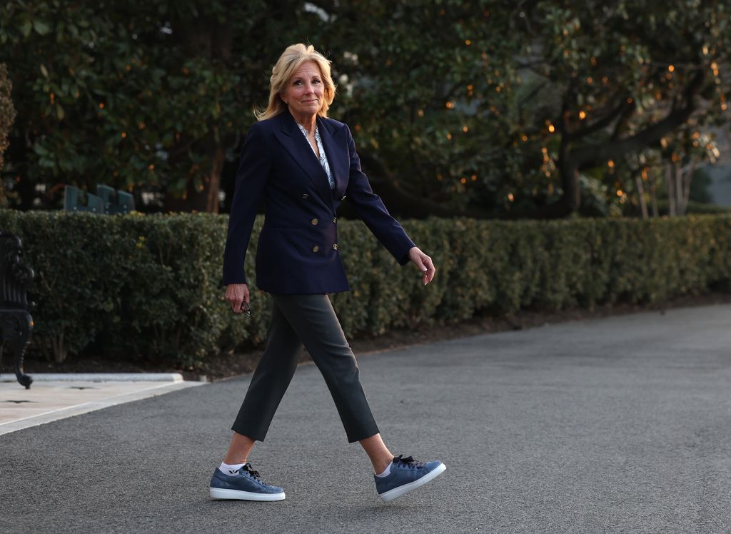 Jill Biden walking across the road in casual clothes