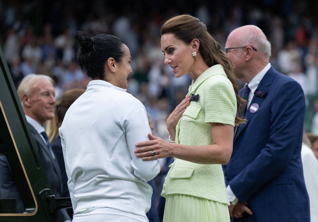 Ons Jabeur of Tunisia is consoled by Catherine, Princess of Wales