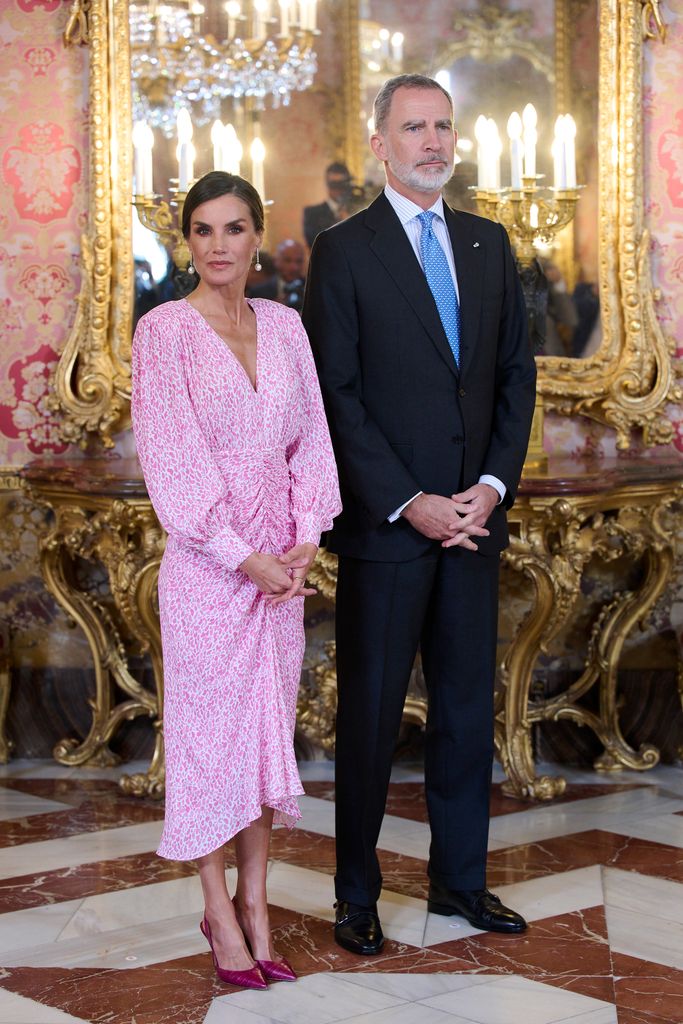 Queen Letizia at palace with felipe in pink