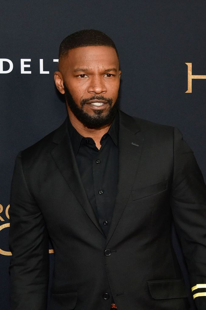Jamie Foxx poses on the red carpet at "Robin Hood" New York screening at AMC Lincoln Square Theater on November 11, 2018 in New York City