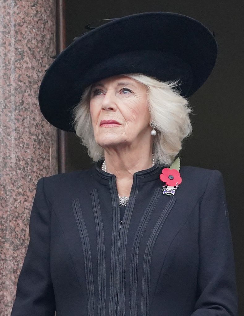 Queen Camilla on a balcony at the Foreign, Commonwealth and Development Office (FCDO) on Whitehall, during the Remembrance Sunday service at the Cenotaph, in Whitehall, London. Picture date: Sunday November 12, 2023. 