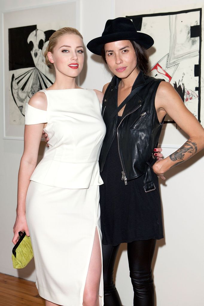 Amber Heard and artist Tasya Van Ree attends Tasya Van Ree's private viewing of "Distorted Delicacies" at Vs. Magazine & Creative Studios Paris' Space on June 22, 2011