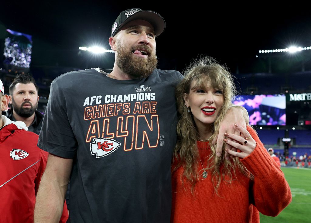  Travis Kelce #87 of the Kansas City Chiefs celebrates with Taylor Swift after a 17-10 victory against the Baltimore Ravens in the AFC Championship Game at M&T Bank Stadium on January 28, 2024 in Baltimore, Maryland. (Photo by Patrick Smith/Getty Images)