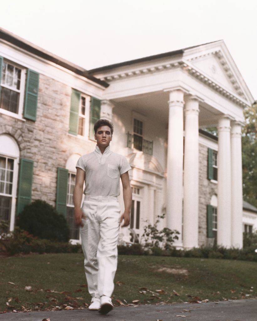 Elvis Presley strolls the grounds of his Graceland estate in circa 1957