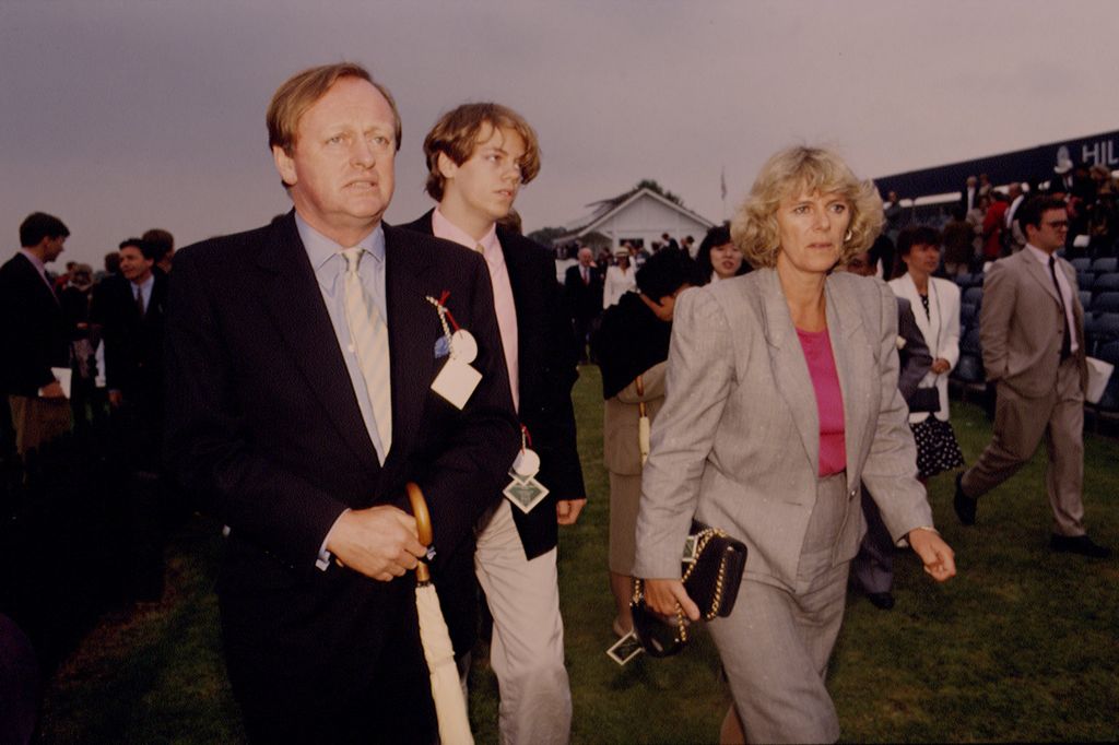 Andrew Parker Bowles and Tom Parker Bowles walking with Queen Camilla