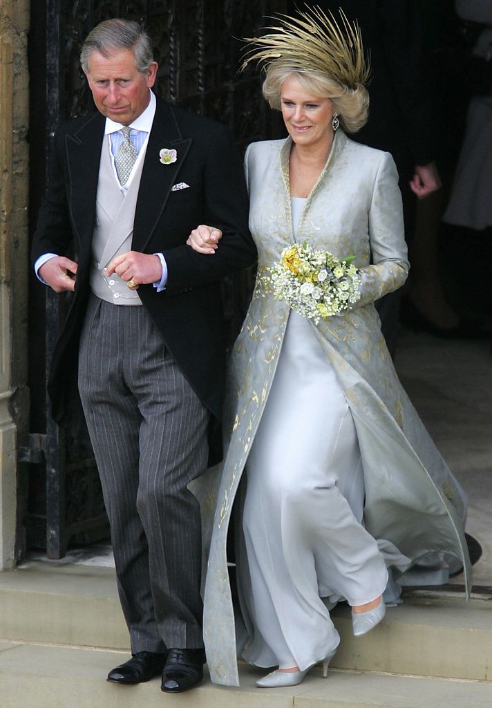 Prince Charles linking arms with his new wife Camilla