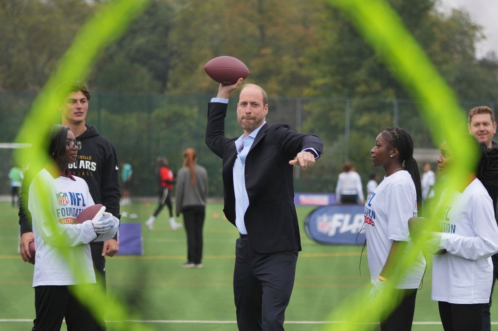 Prince William throwing an American football