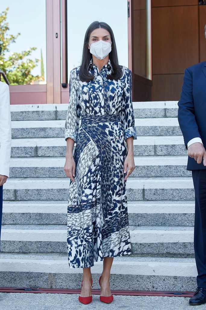 Queen Letizia wearing an animal-print skirt and shirt co-ord from Victoria Beckham
