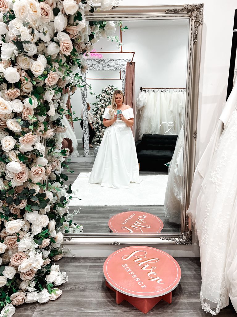 Louise Pentland taking a selfie in her wedding dress