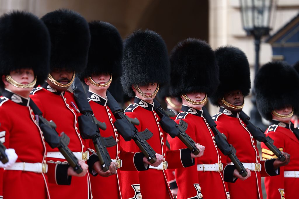 Members of the Kings Guard line up in front of Buckingham Palace prior to the Changing of the Guard Ceremony on April 8, 2024 