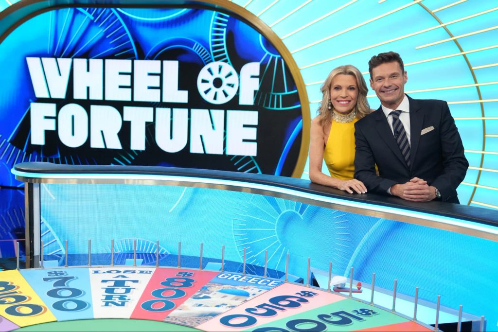 Ryan Seacrest and Vanna White on set of Wheel Of Fortune