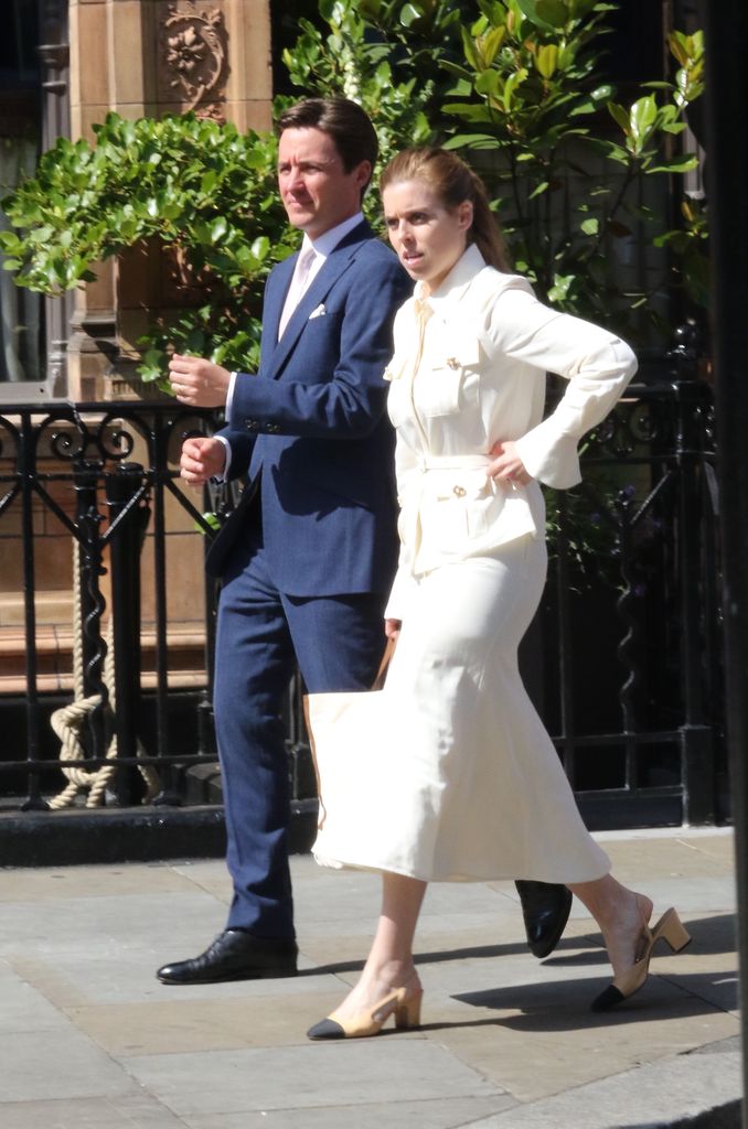 Princess Beatrice in white jacket and skirt leaving The Audley pub with Edoardo Mapelli Mozzi