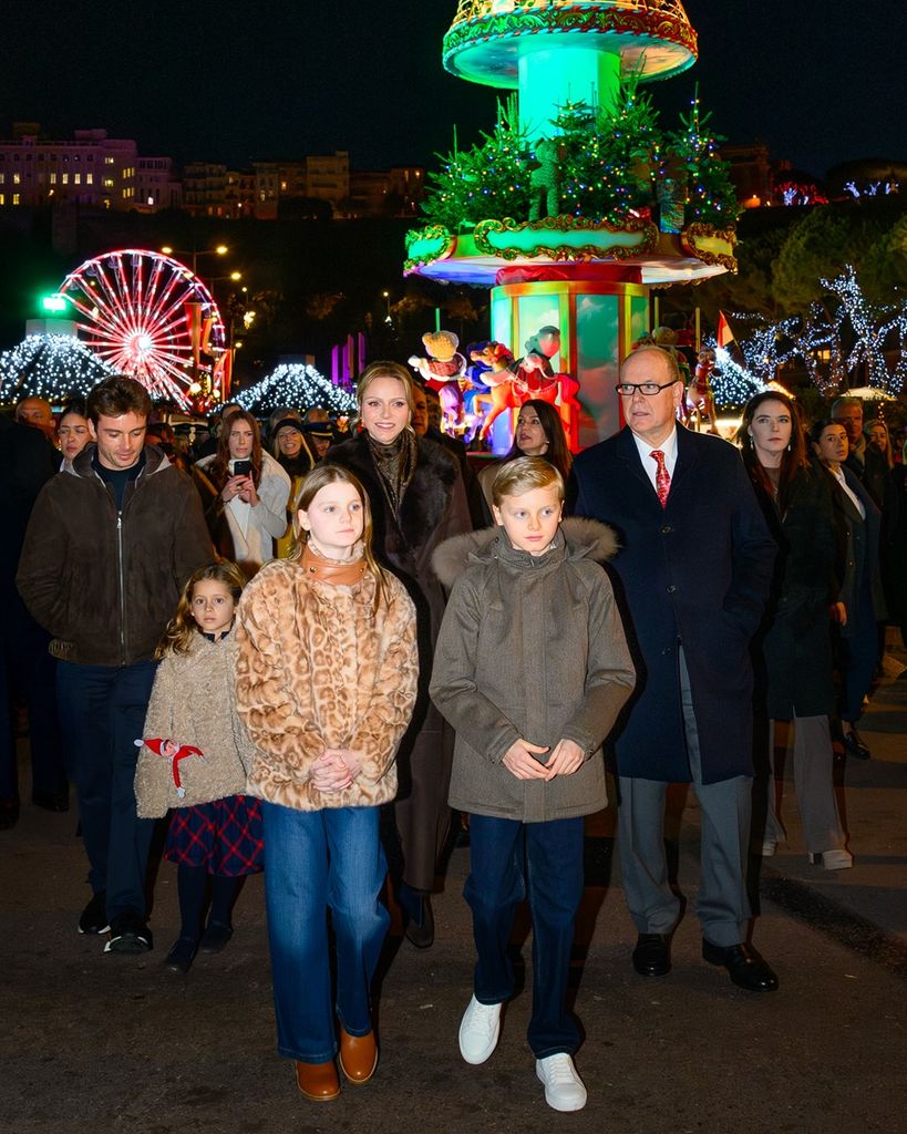 monaco royals at christmas fair in coats