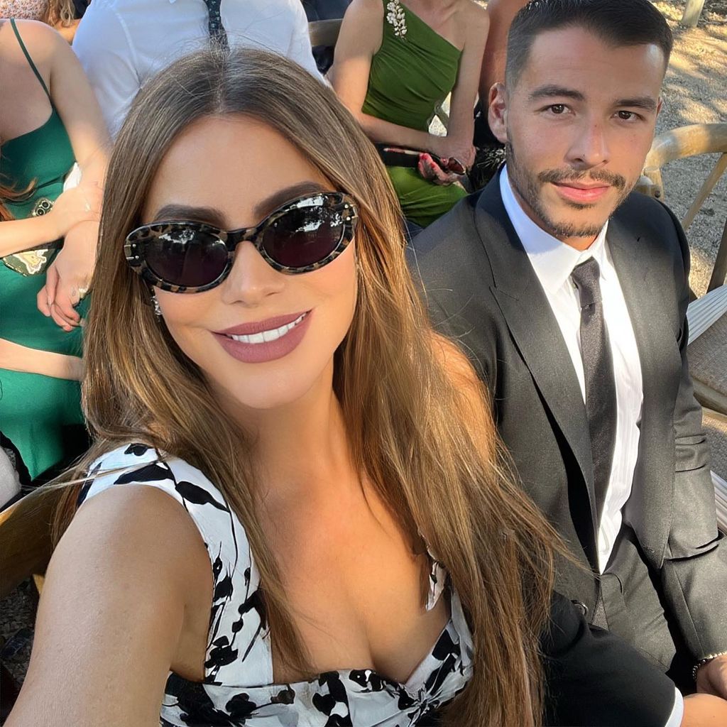 Sofia smiling in selfie with oval sunglasses