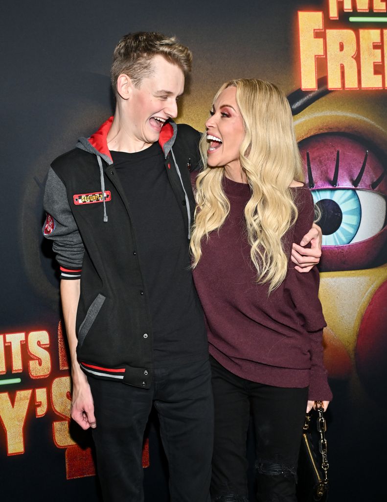 photo of jenny mccarthy and son evan on red carpet