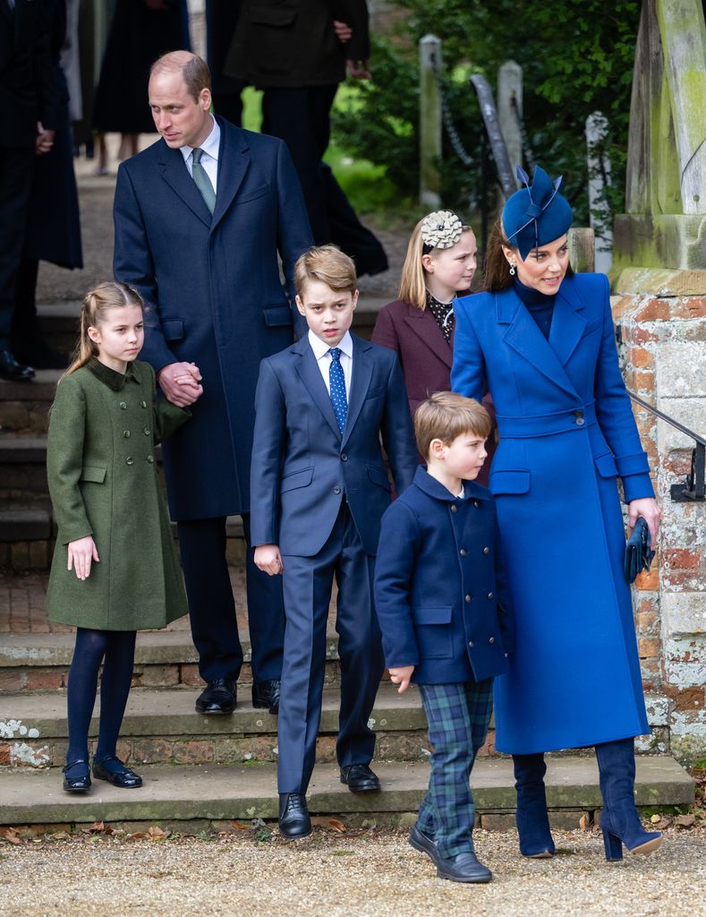 Princess Kate in blue alongside her three kids