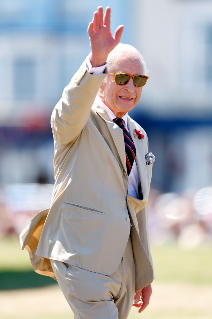 King Charles III after meeting volunteers taking part in a litter picking session during a beach clean-up initiative