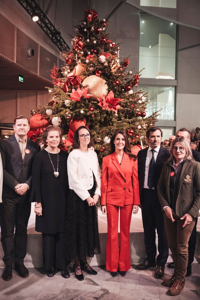 Princess Marie wearing a red suit