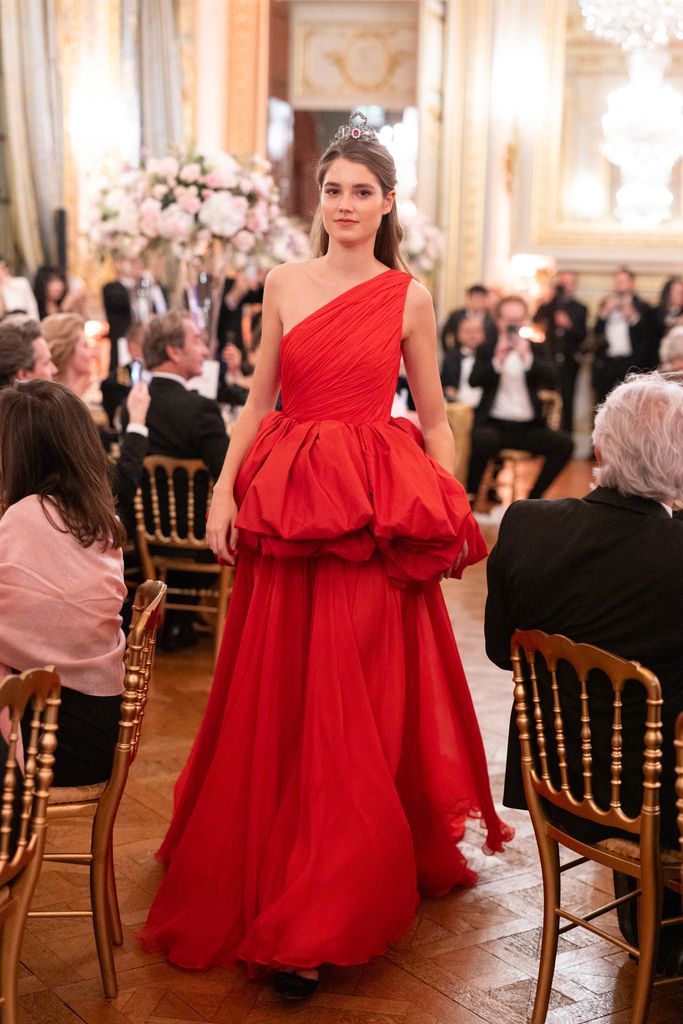 Lady wearing romantic red gown and tiara