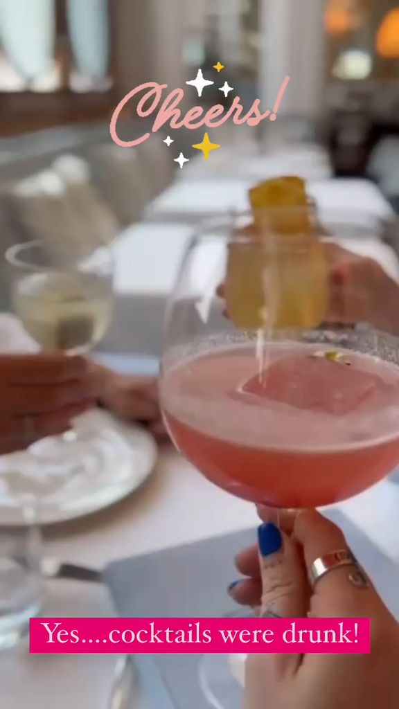 Three women cheersing cocktails