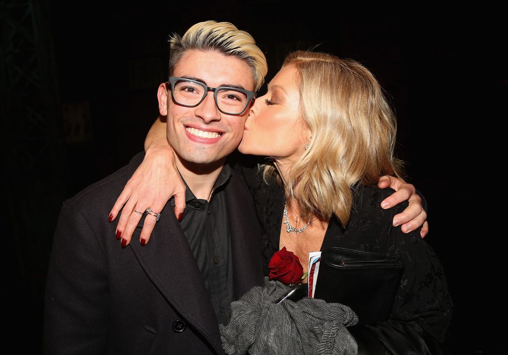 Michael Consuelos and Kelly Ripa pose backstage as Jake Shears of the rock group "The Scissor Sisters" makes his Broadway debut in the hit musical "Kinky Boots" on Broadway at  The Al Hirschfeld Theatre on January 8, 2018 in New York City.