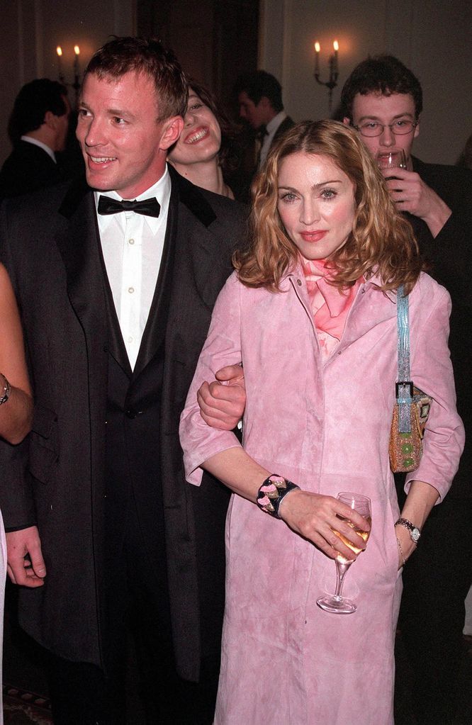 Guy Ritchie standing with Madonna
